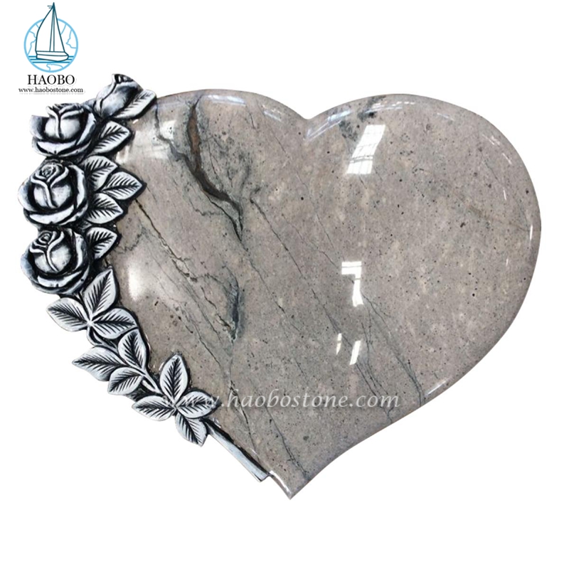 Hochwertiger Granit in Herzform mit blumengeschnitztem Grabstein
